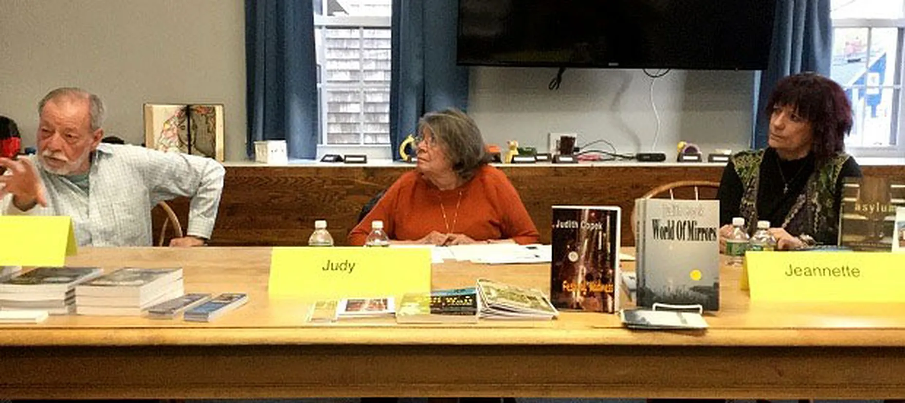 Jeannette de Beauvoir on a panel with fellow authors.