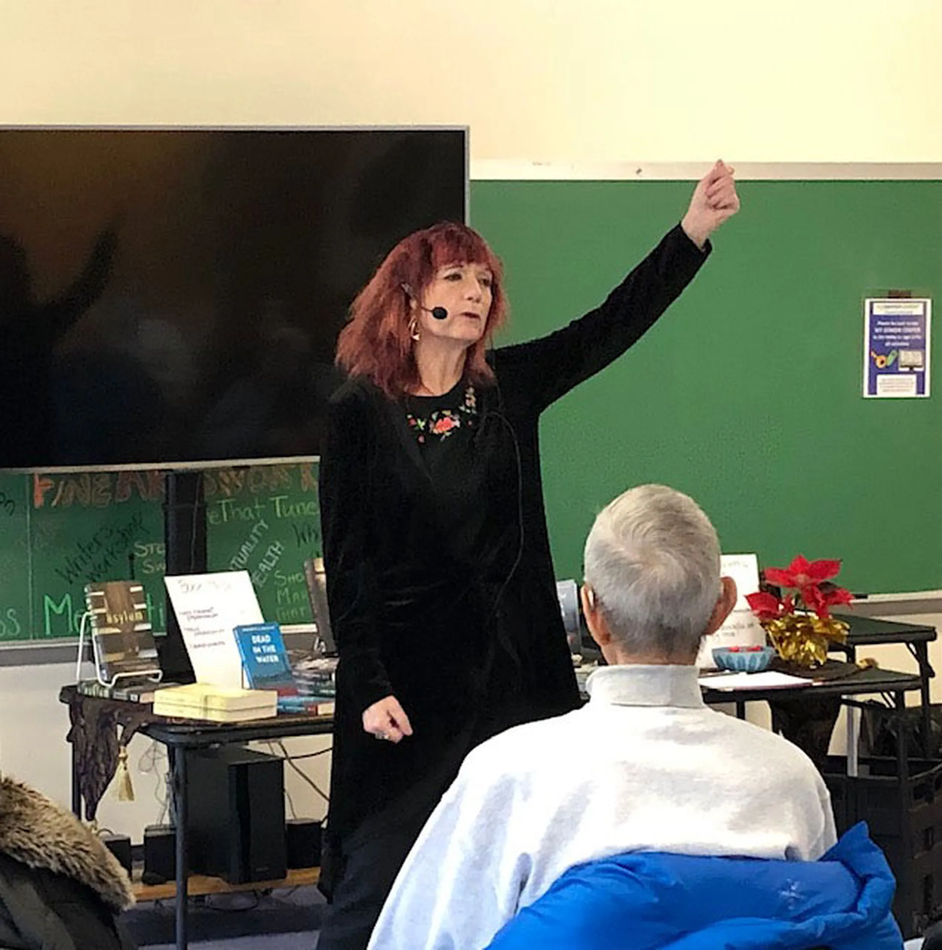 Jeannette de Beauvoir speaking at a Provincetown author event.