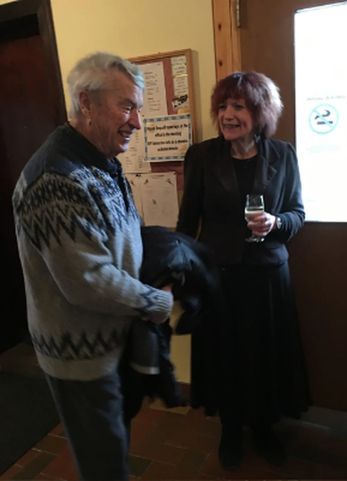 Jeannette de Beauvoir meeting readers at an event.