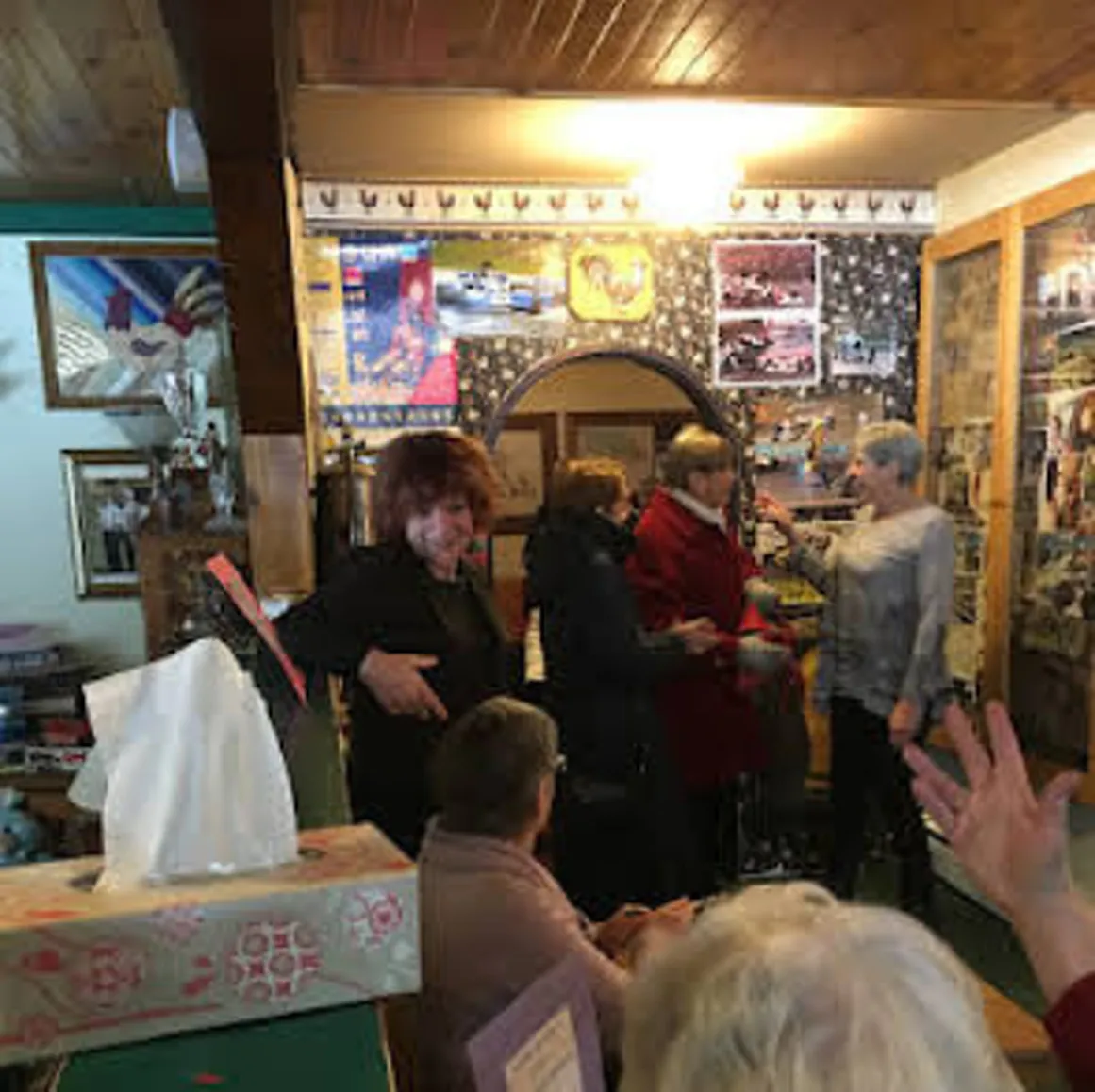 A busy community event with Jeannette de Beauvoir.